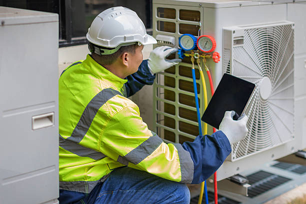 Professional Hvac technician working in Gambier, OH